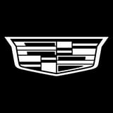 Cadillac logo featuring a white line art shield-shaped emblem with geometric pattern